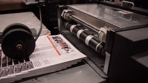 Magazines rolling off a printing press