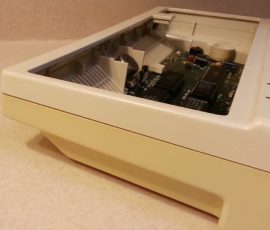 The top and bottom of this case represent the before and after of using Retr0bright. IIc6